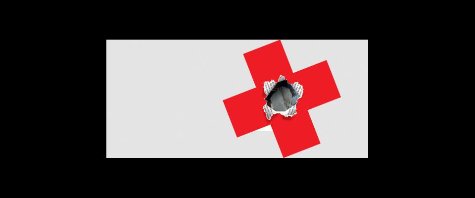 red cross with bullet hole