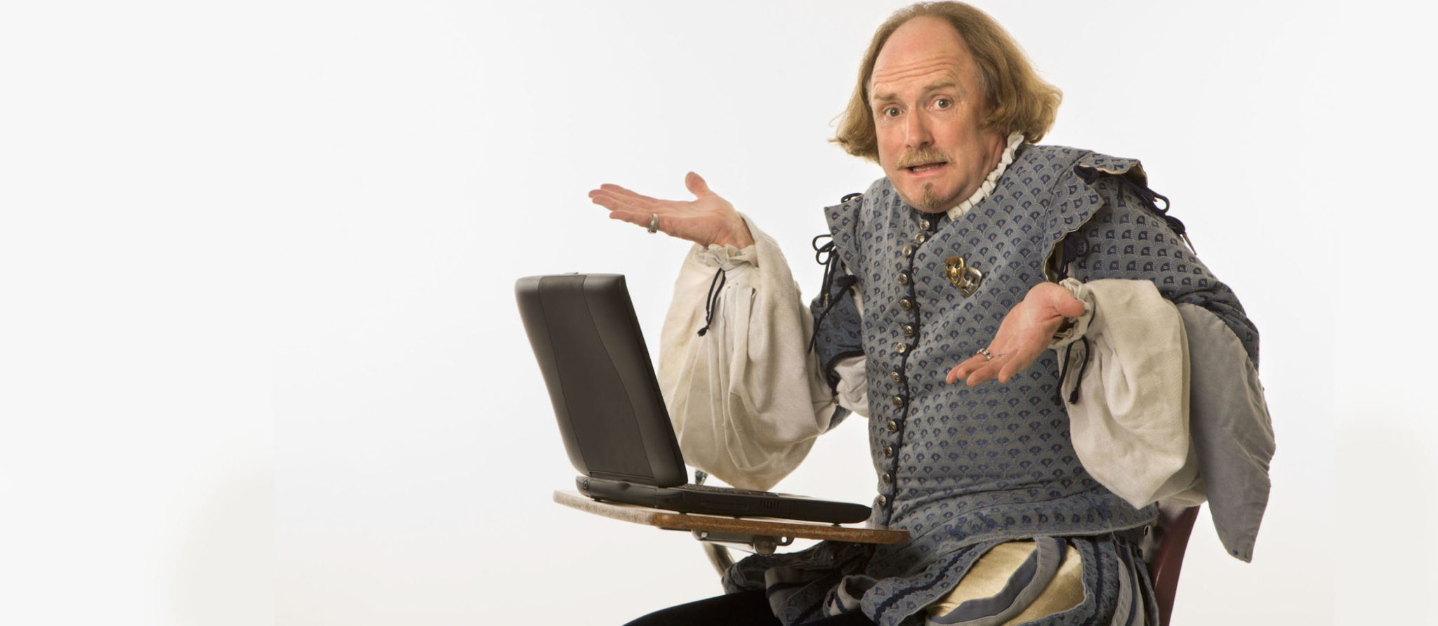 Image of Shakespeare using a laptop
