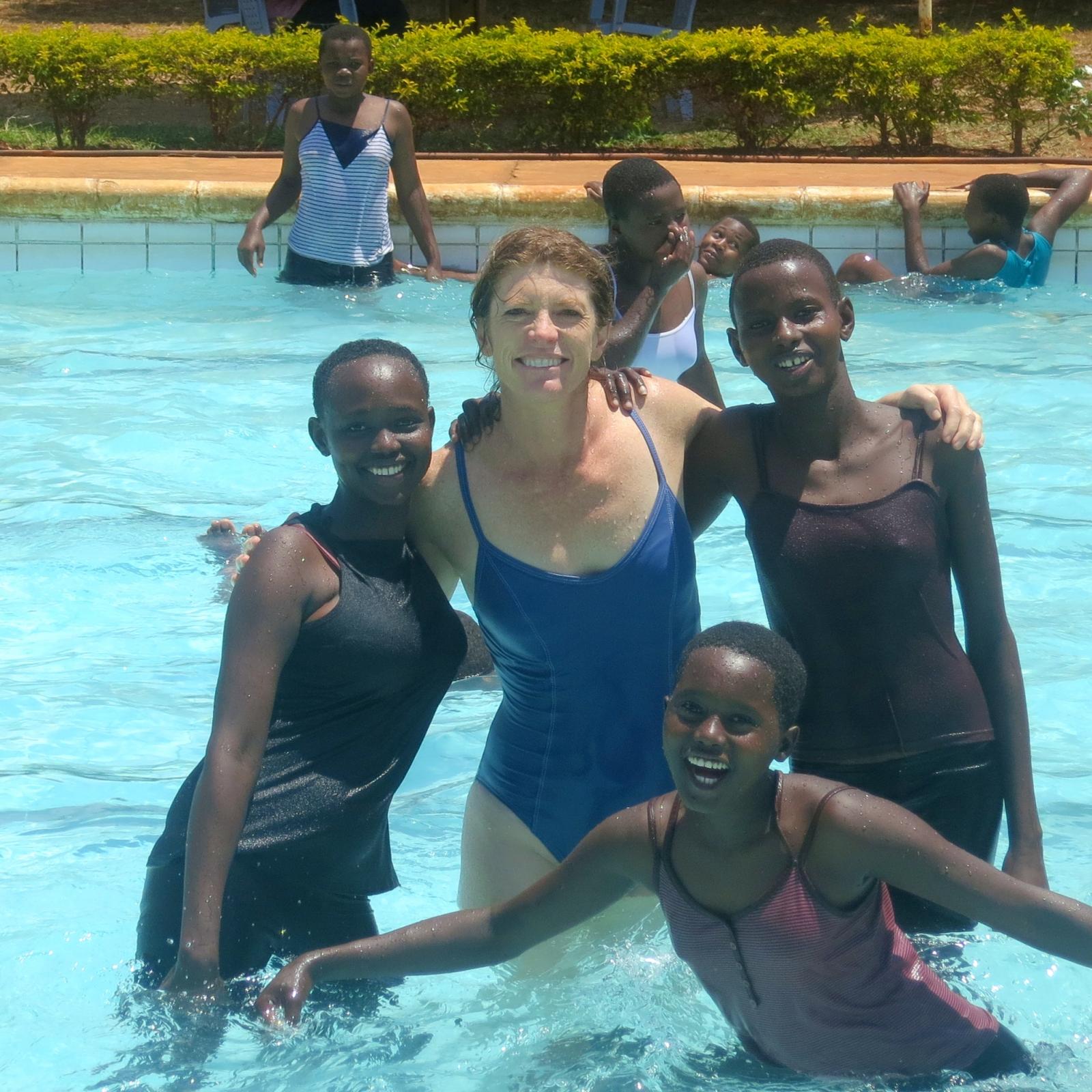 April Gilbert teaching girls how to swim 
