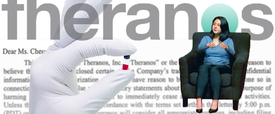 Erika Cheung in a chair, the word theranos behind her