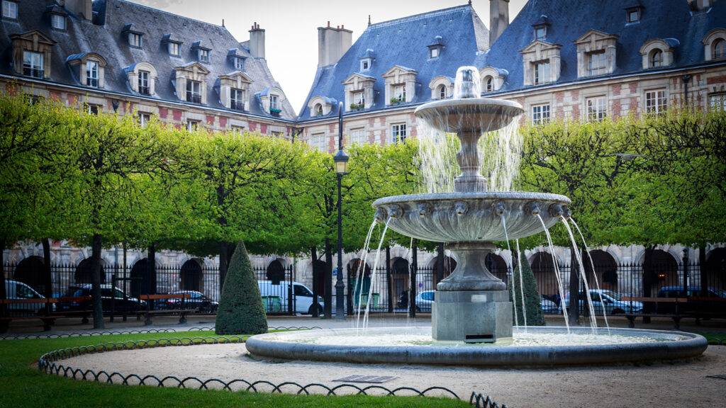 Fountain in La Place des Vosges in Paris