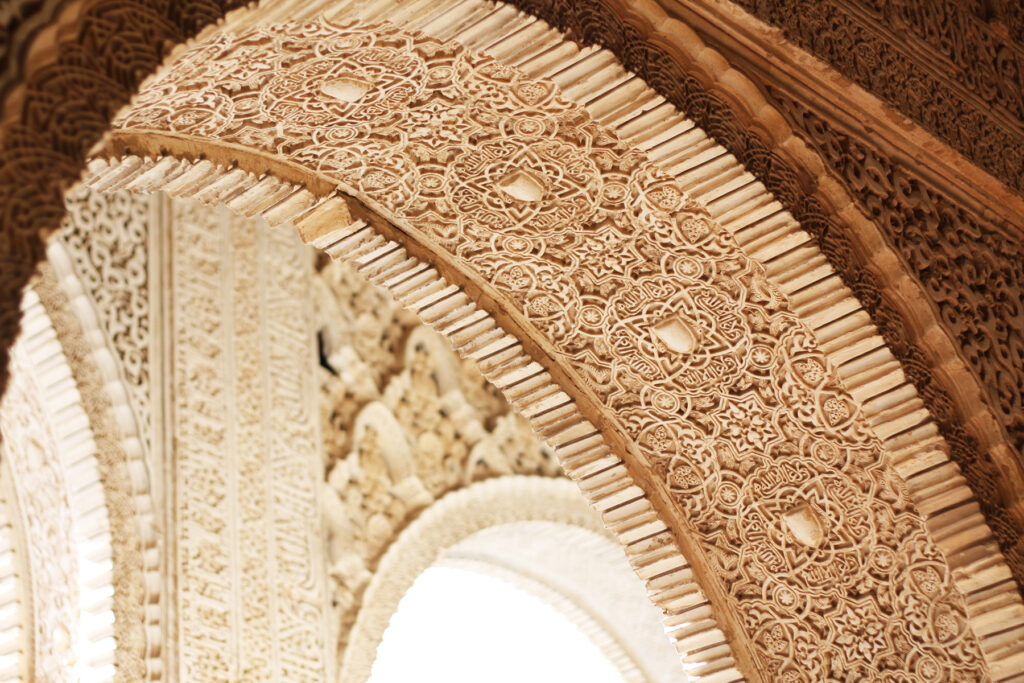 Closeup of arch in the Palacios Nazaries of the Alhambra