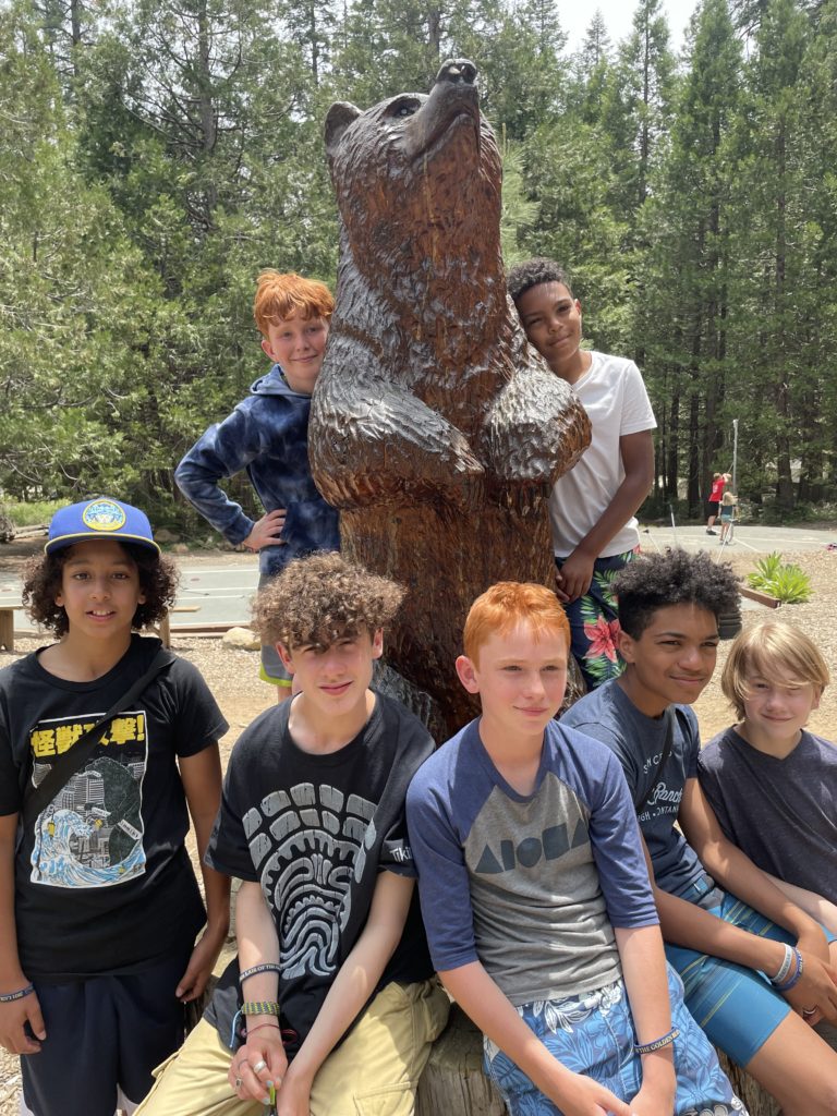 boys with bear statue