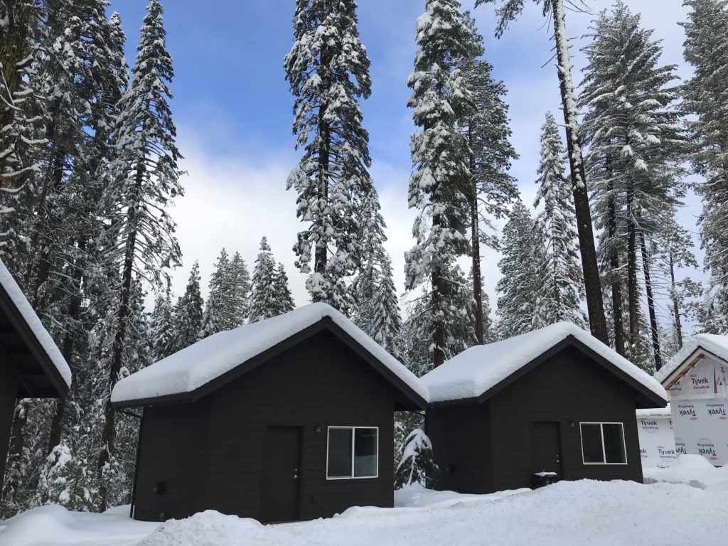 cabins in winter snow