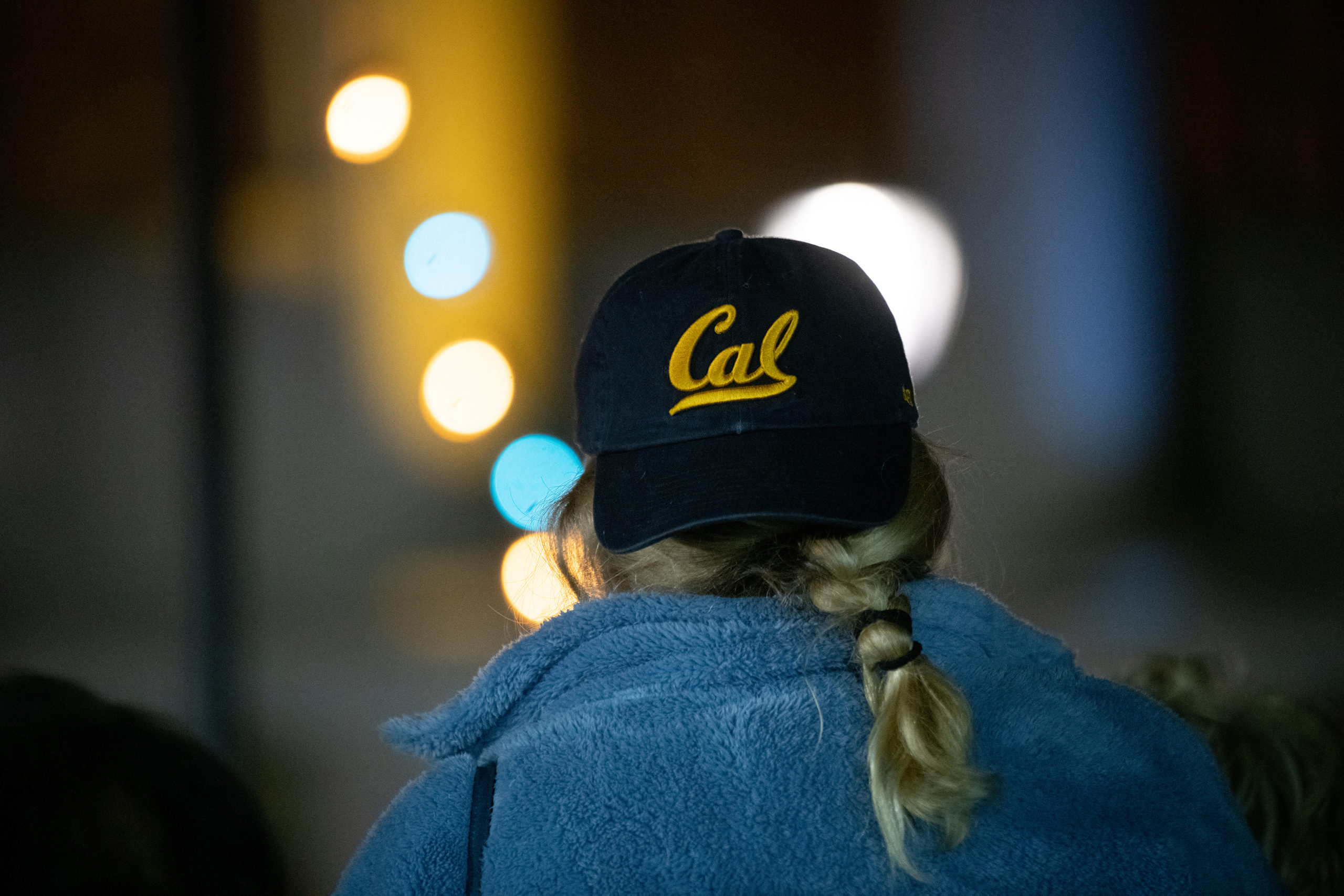 Woman wearing a Cal baseball cap