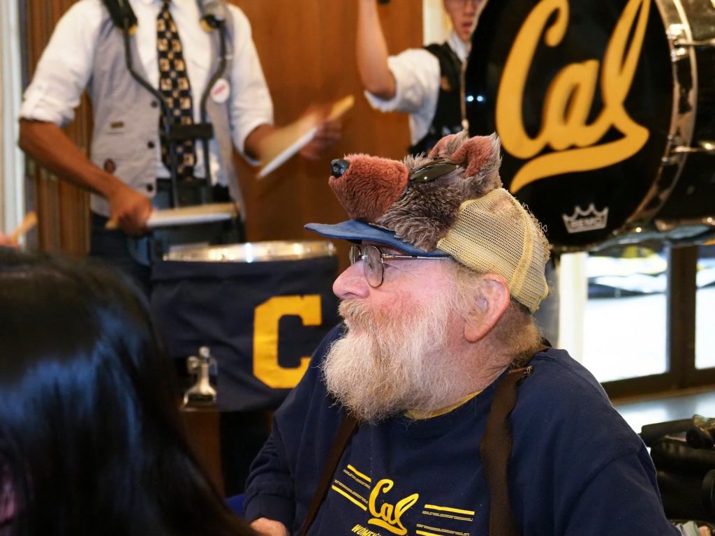 person laughing wearing bear hat