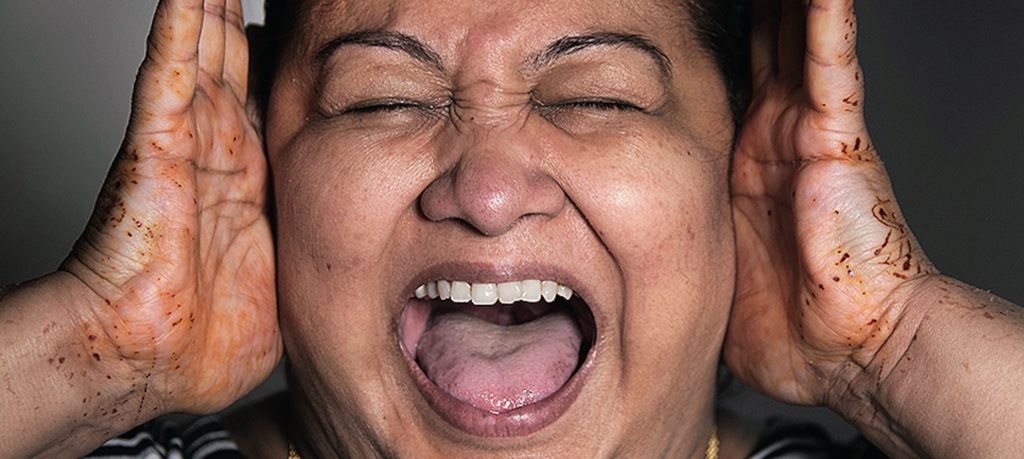 Close up of woman screaming