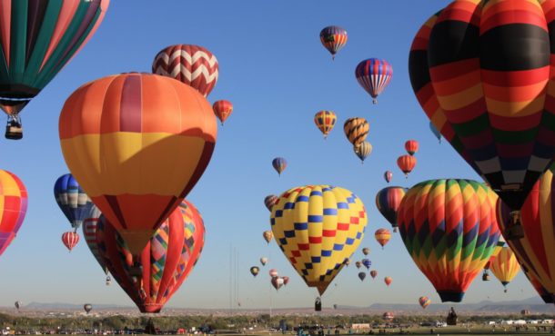 Clump of hot air balloons in air