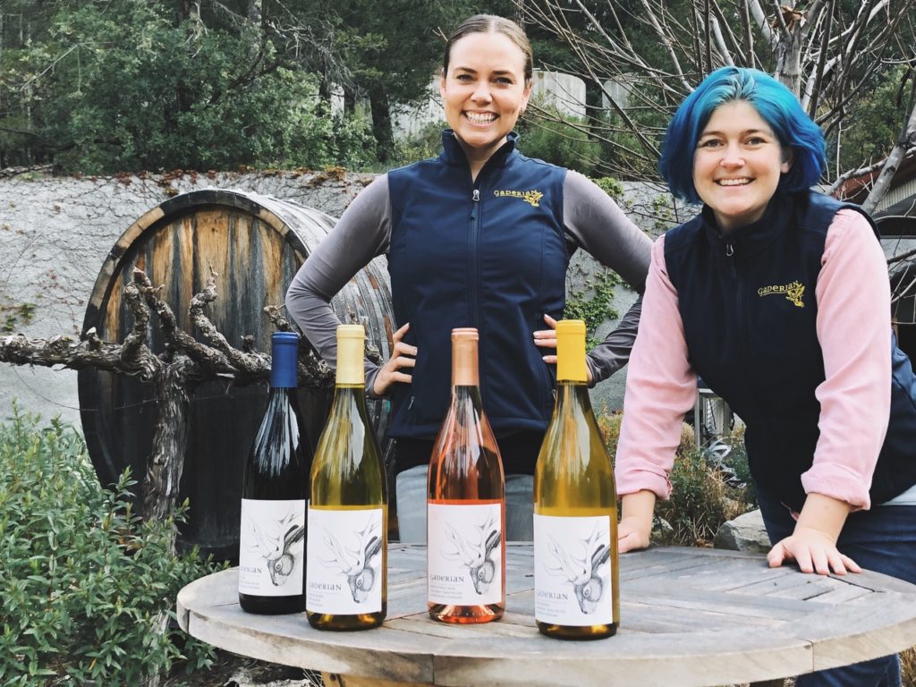 Natalie Coughlin and Shaina Harding, owners of Gaderian Wines, pose with wine bottles from Gaderian Wines.