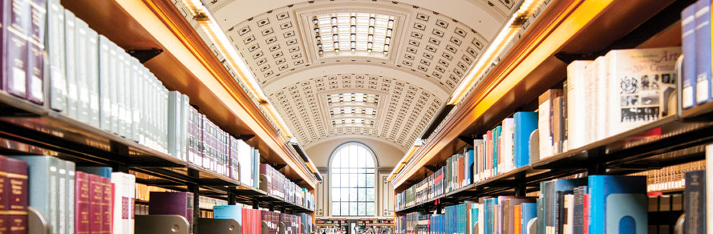 The interior of Doe Library showing shelves of books