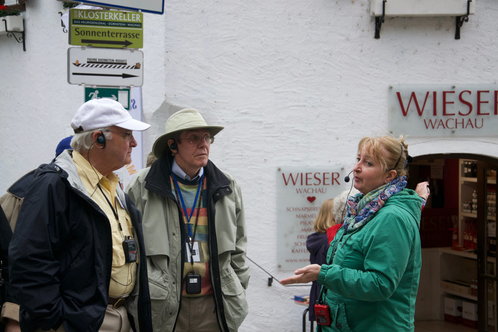 Tour guide talking with two travelers in the Wachau Valley