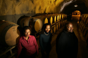 Celia Deneen Brown '90, Coral Brown '89, and David Brown, inside their wine cave