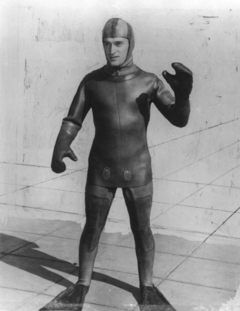 Man in an old wetsuit
