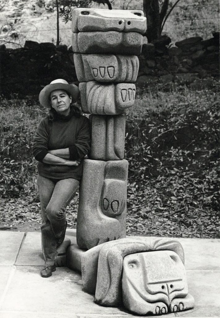 Fuller next to her sculpture