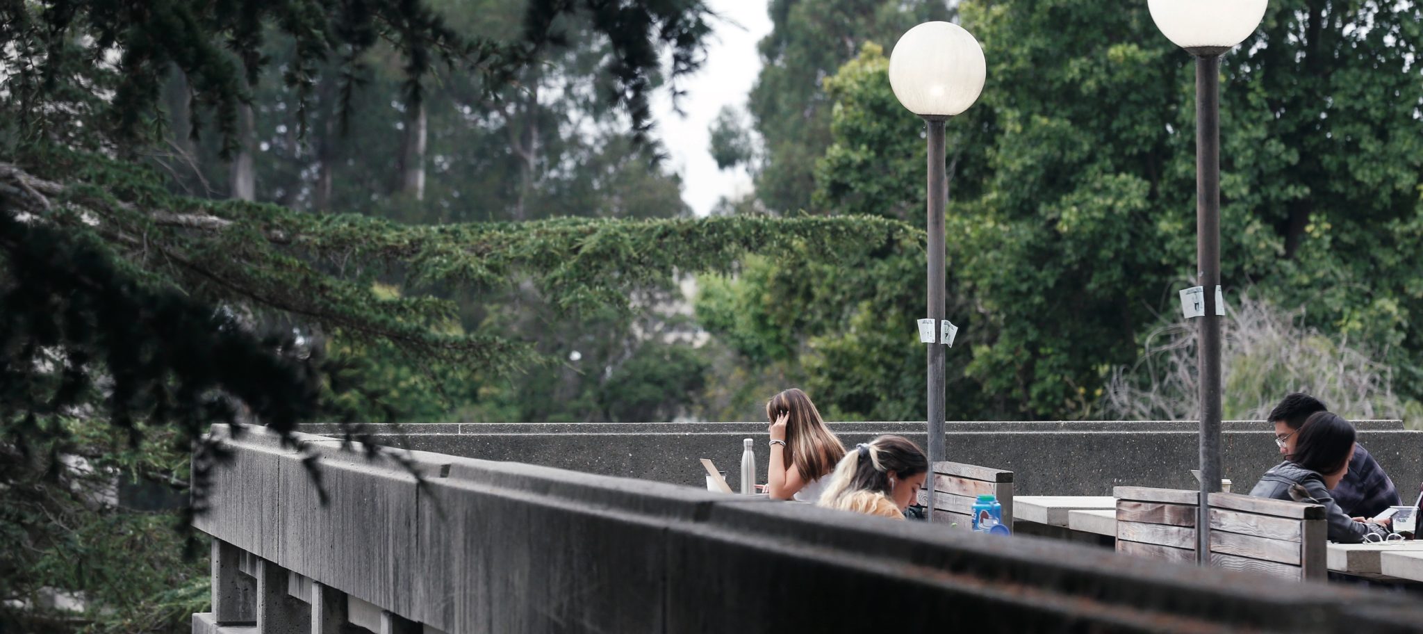 Students study on the patio of the Free Speech Movement Cafe in the Moffitt Undergraduate Library at UC Berkeley on Wednesday, Aug. 28, 2019.