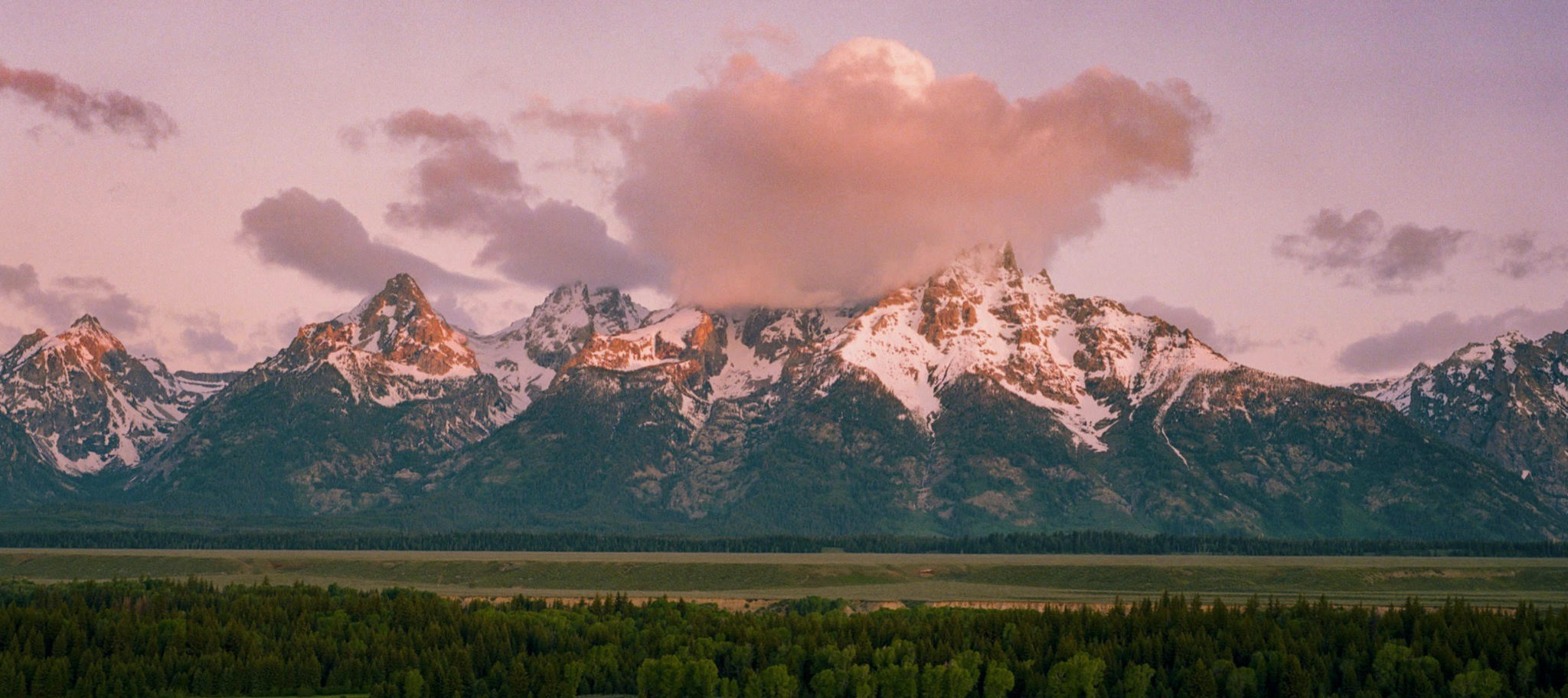 view of the tetons at sunset
