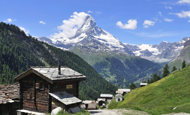 Mountain village in front of snowy Matterhorn,