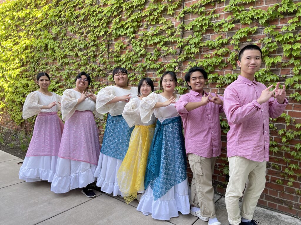 Neil Arcellana poses with his dance club at the University of Pacific’s 25th Pilipino Cultural Night.