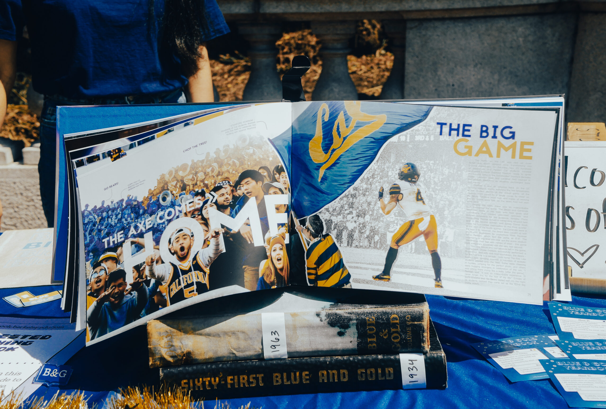 A Blue & Gold yearbook rests on a table showing two pages celebrating Cal winning the Big Game.