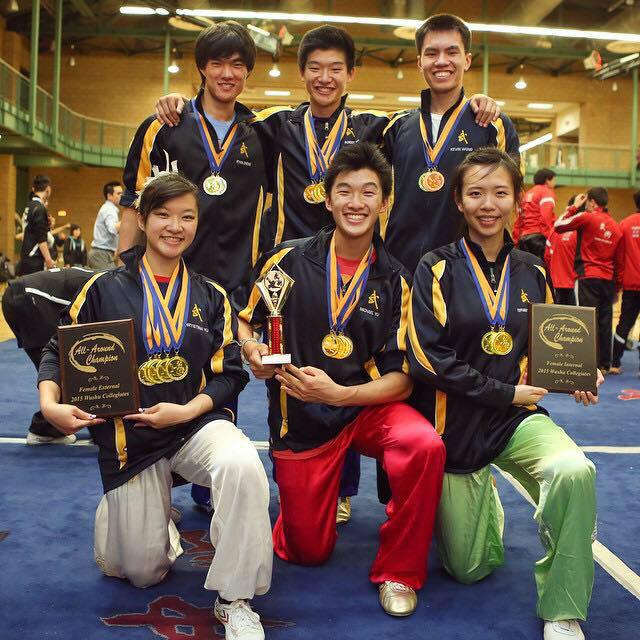 Robert Yu poses with members of the Cal Wushu team. 