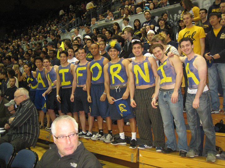 Anderson Franco and his group of friends spell out the word "California" with painted letters on their chests. 