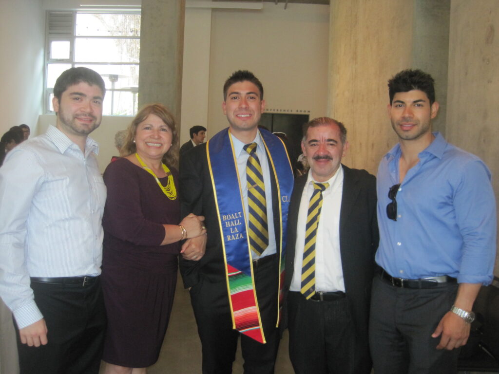Anderson Franco poses with his parents and brothers at his Berkeley Law graduation. 