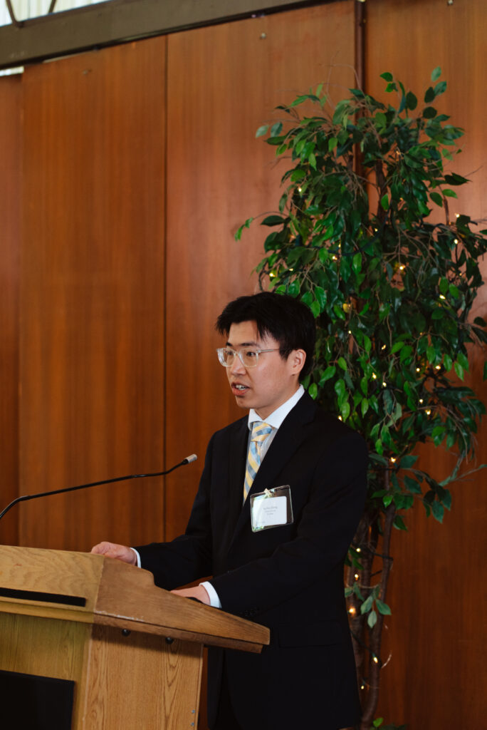 Jayden Zheng speaking at the 2023 Senior Brunch ceremony. 
