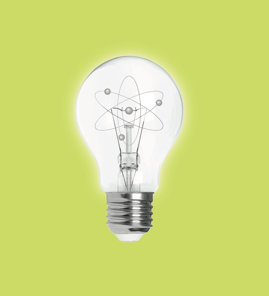 Glowing electric light bulb isolated
