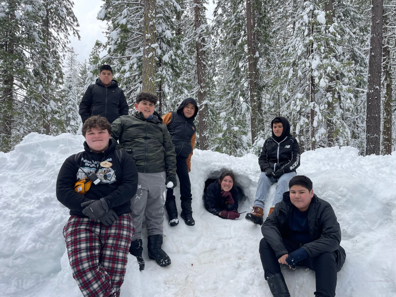 Students play in the snow during their stay at the Lair for Oski Science Camp.