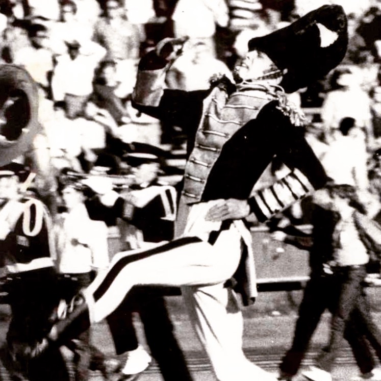 Mart performing as drum major in the University of California Marching Band during his time as a student.