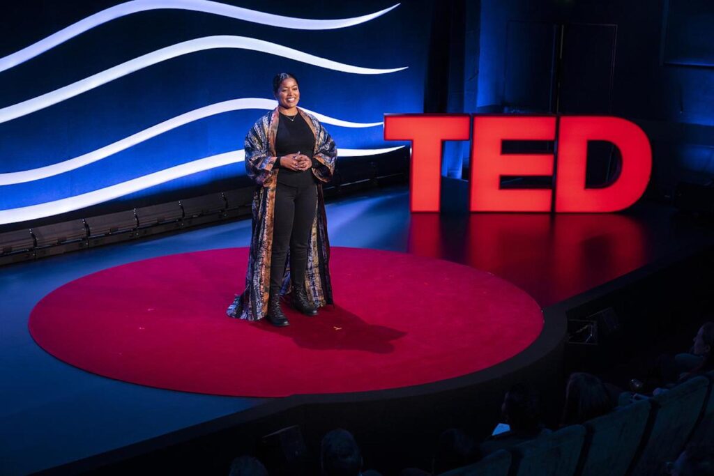 Shirley giving a TED Talk