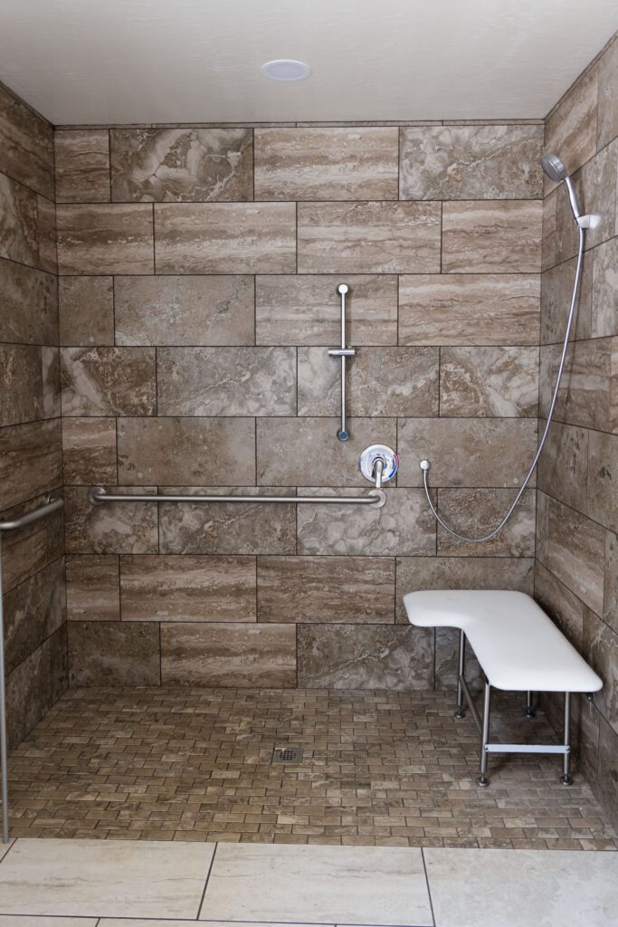 Inside of an ADA-compliant shower in the year round cabin.