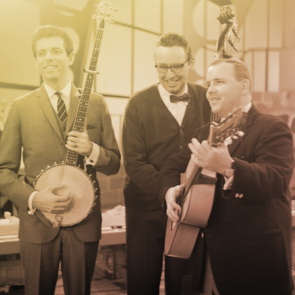 The Limeliters holding their instruments