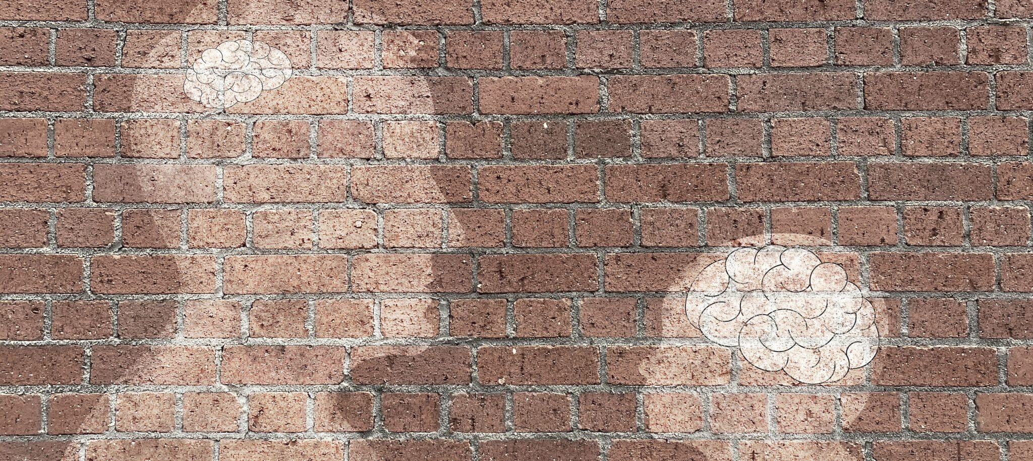 As one ages the brain becomes smaller, illustration of an adult and a child on a brick wall