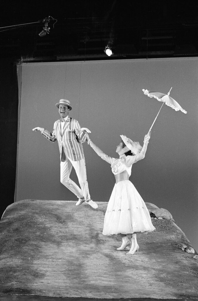 Mary Poppins in front of a green screen