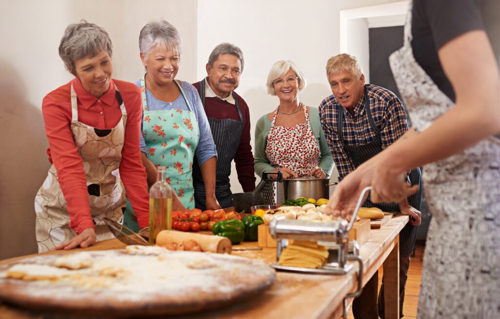 adults attend a cooking class