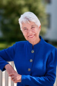 Chancellor Carol T. Christ in blue jacket