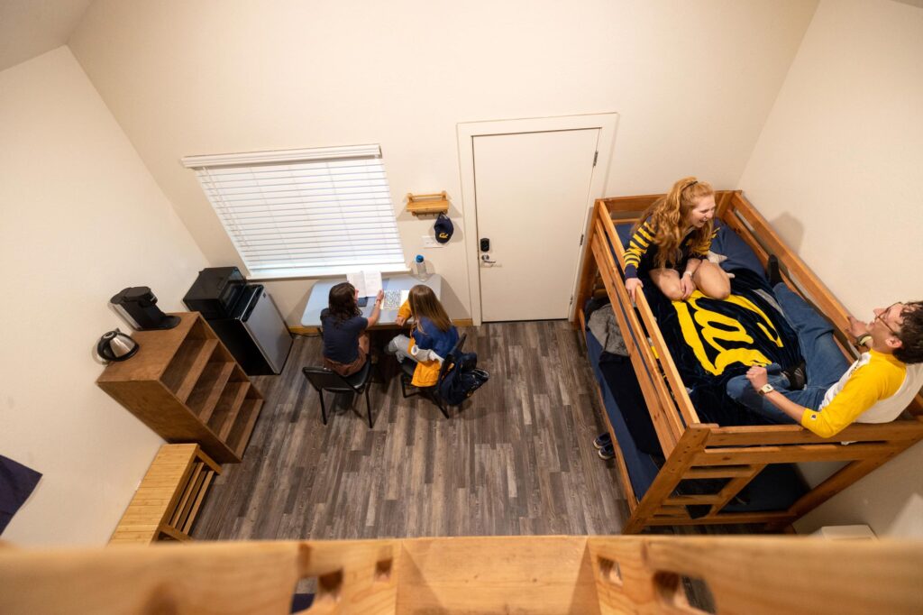 interior view of year-round cabin showing a desk and bunkbeds