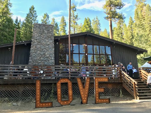 The Camp Blue lodge with large LOVE lettering outside