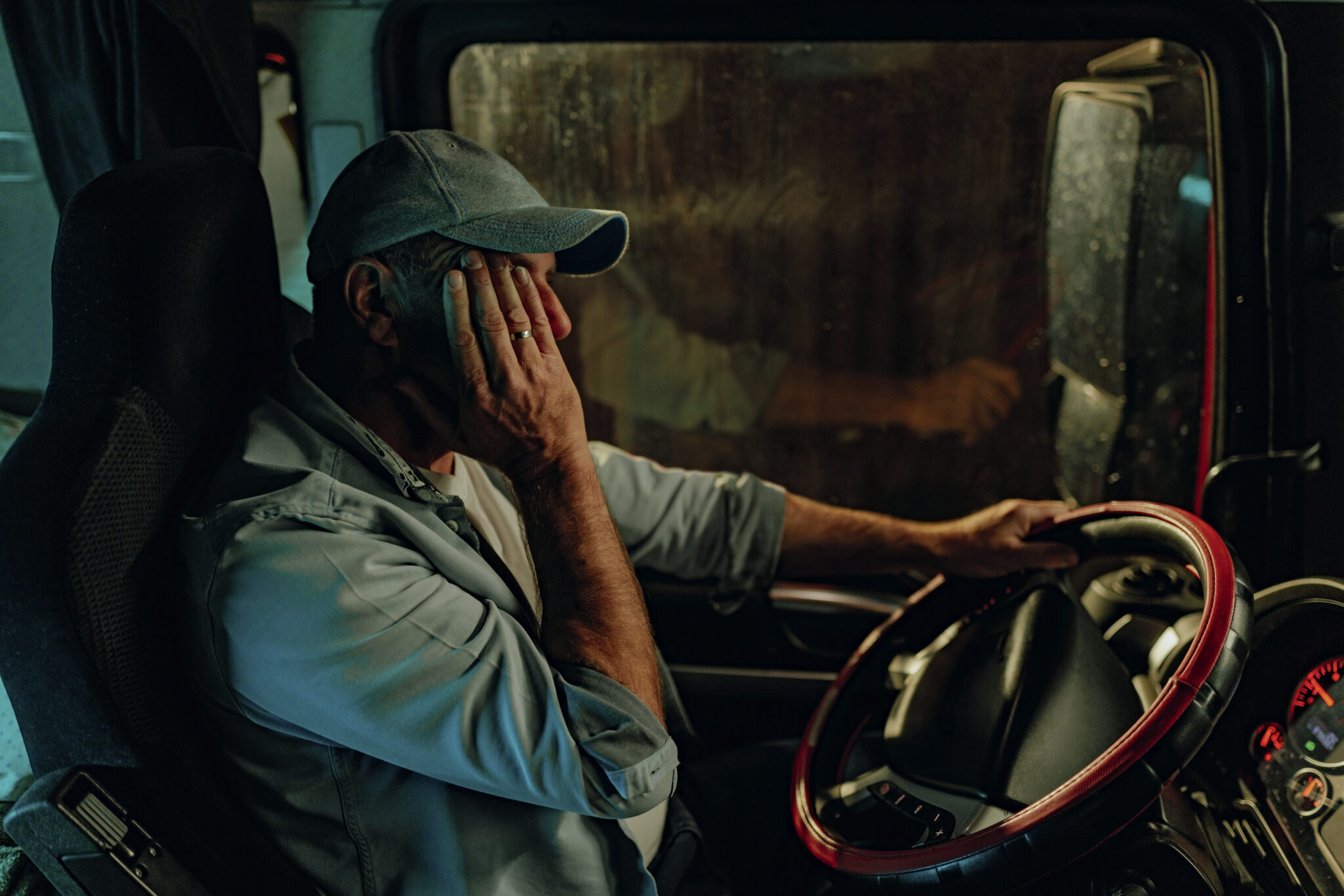 Sleepy truck driver ready for night rest