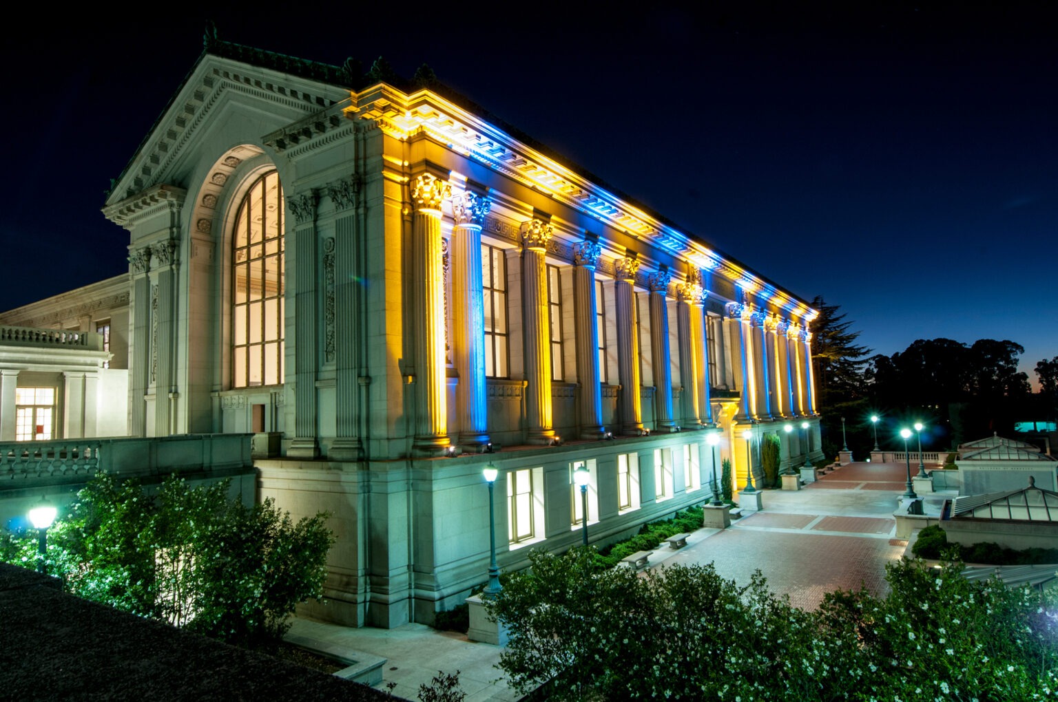 Library lit in blue and gold