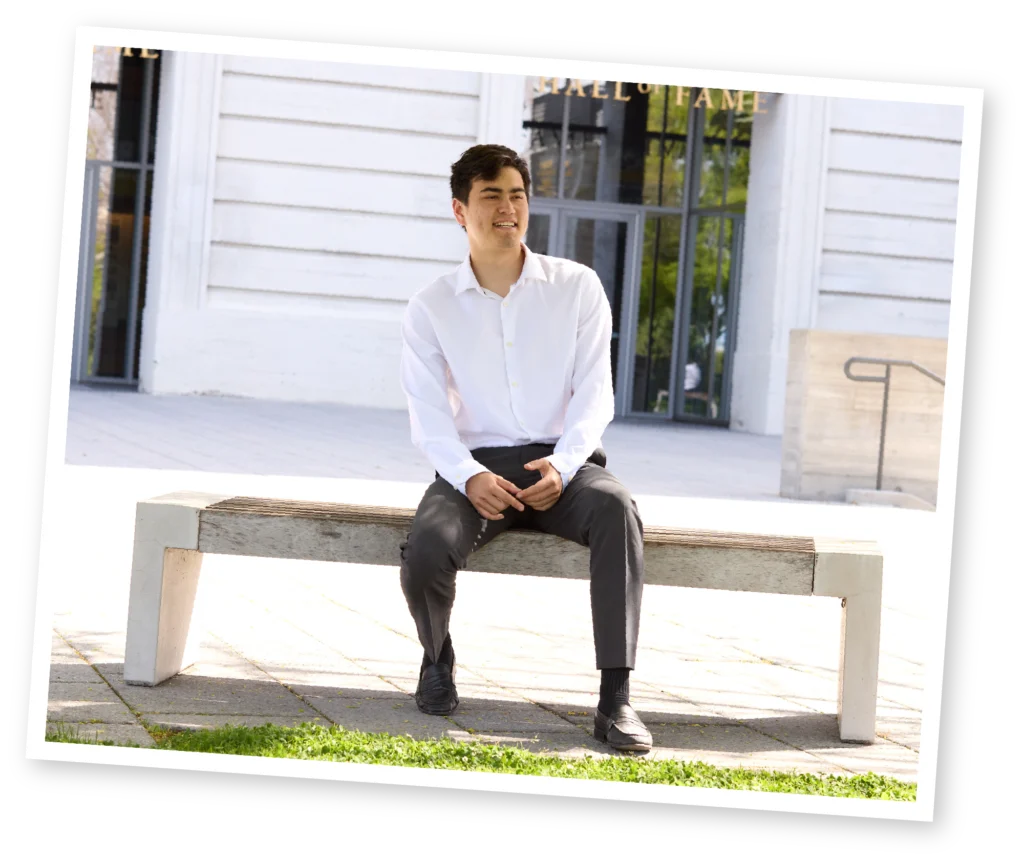 Christopher Jackson Yu in front of a building on the UC Berkeley campus